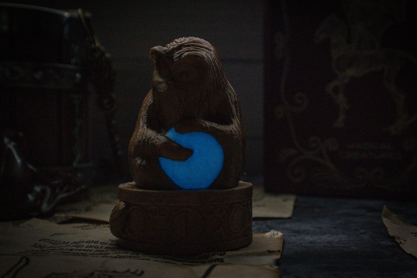 Demiguise statue, glow in the dark - The Flaming Feather & Flaming Filament