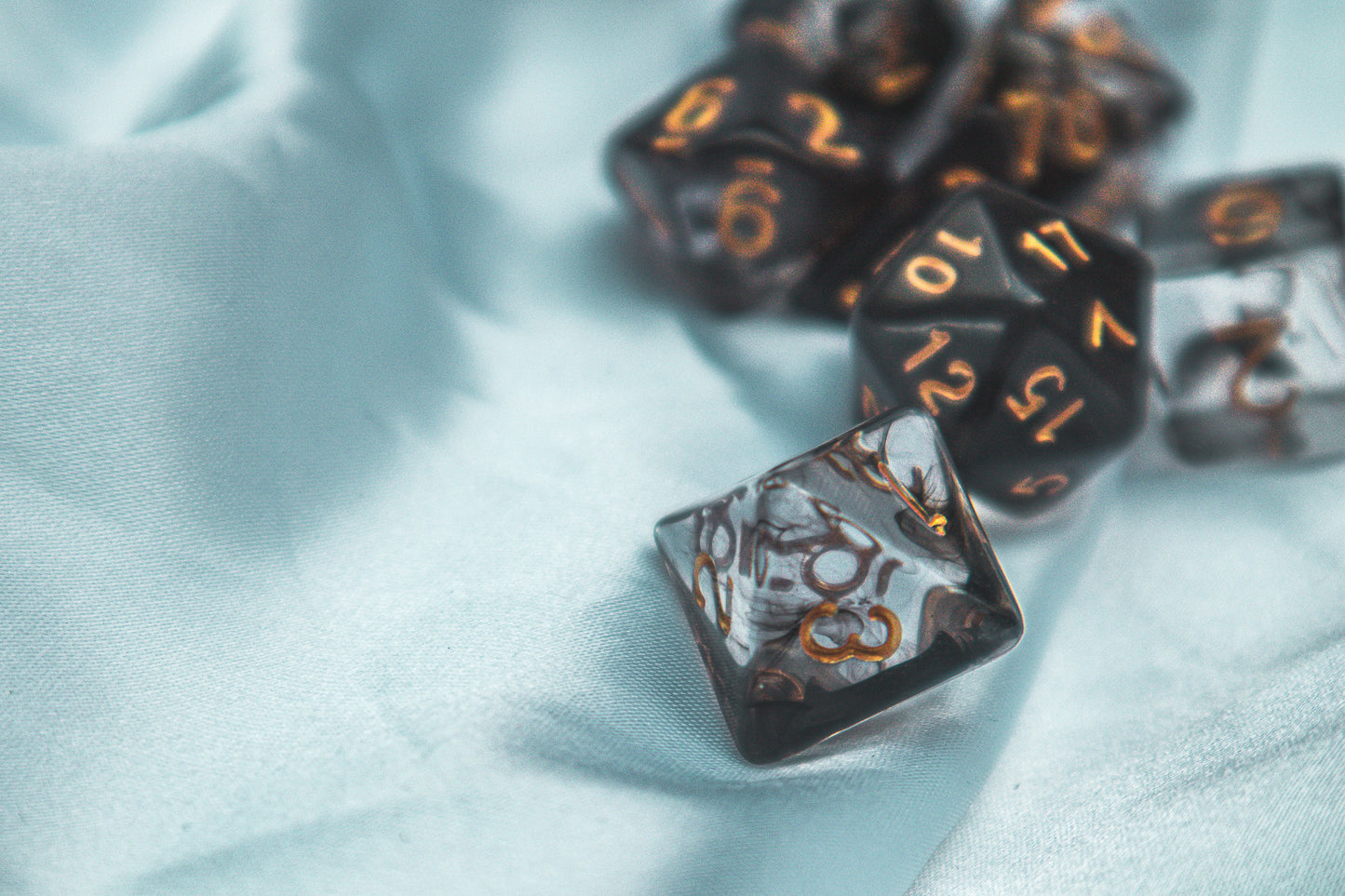 Cursed whispers dice set - The Flaming Feather & Flaming Filament