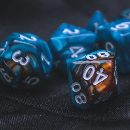 Ocean's Treasure Polyhedral dice set - Soft edge - The Flaming Feather & Flaming Filament