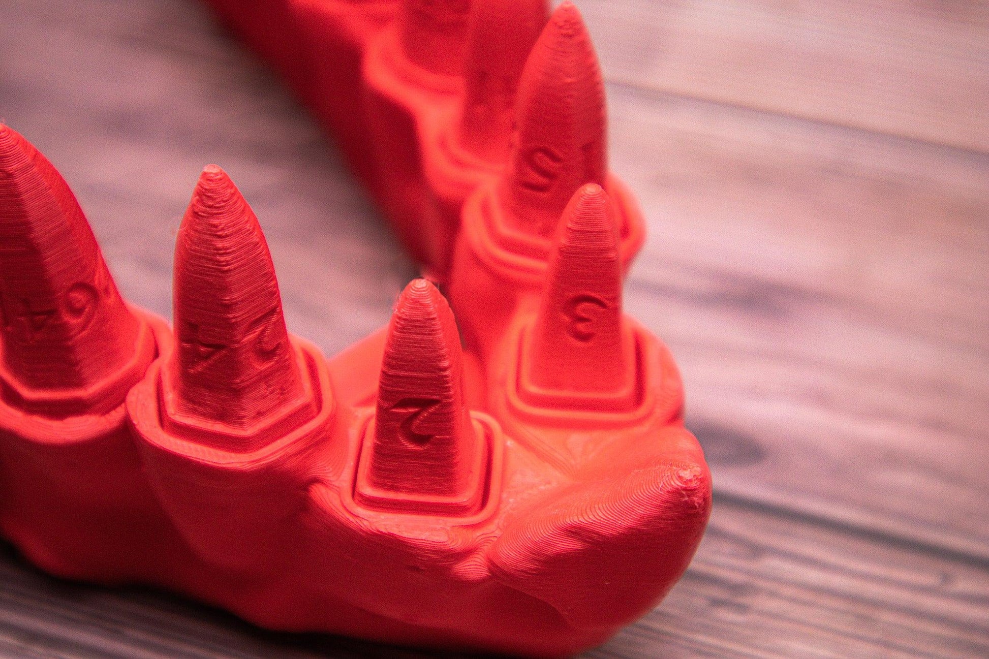 Dragon teeth dice set + holder - The Flaming Feather & Flaming Filament