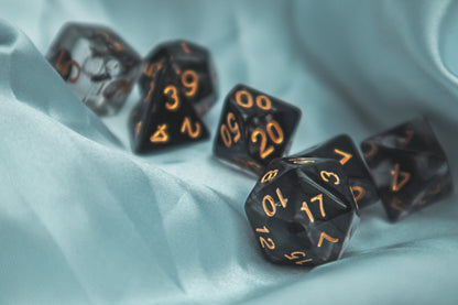 Cursed whispers dice set - The Flaming Feather & Flaming Filament