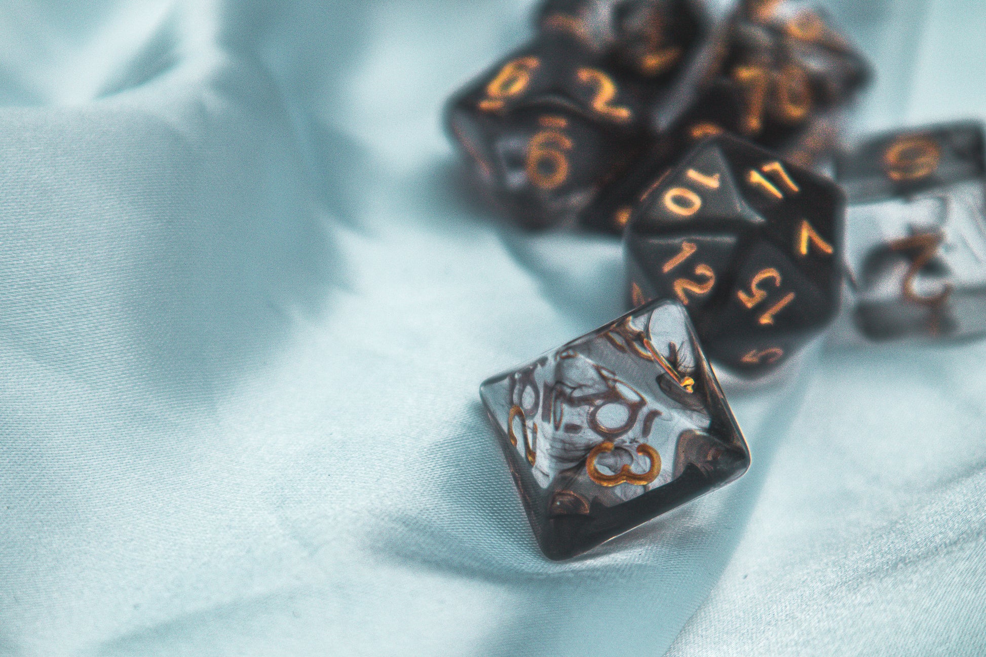 Cursed whispers dice set - The Flaming Feather & Flaming Filament