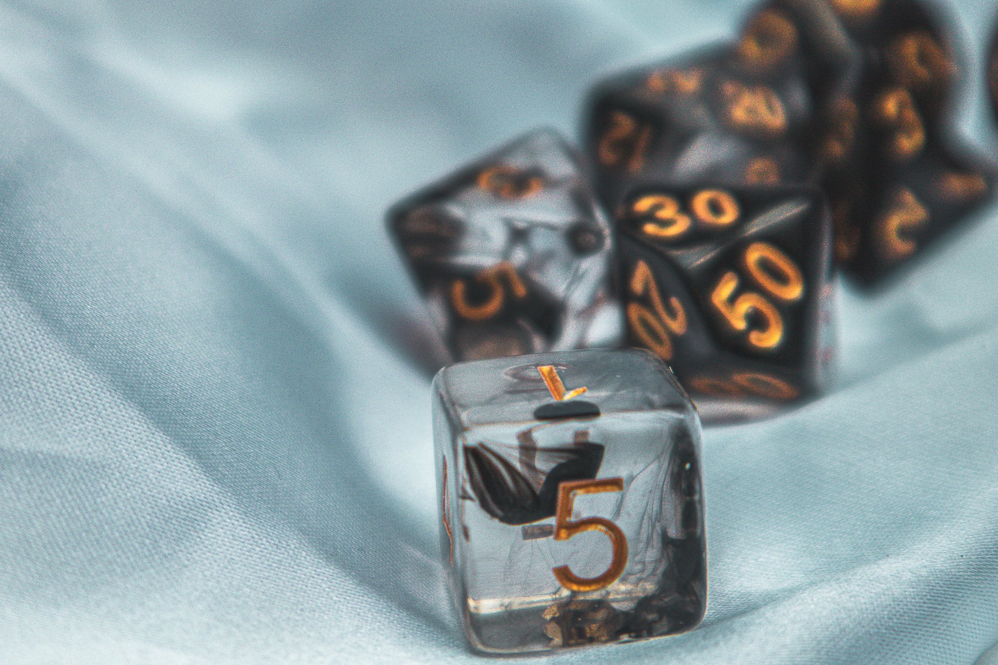 Cursed whispers dice set - The Flaming Feather & Flaming Filament