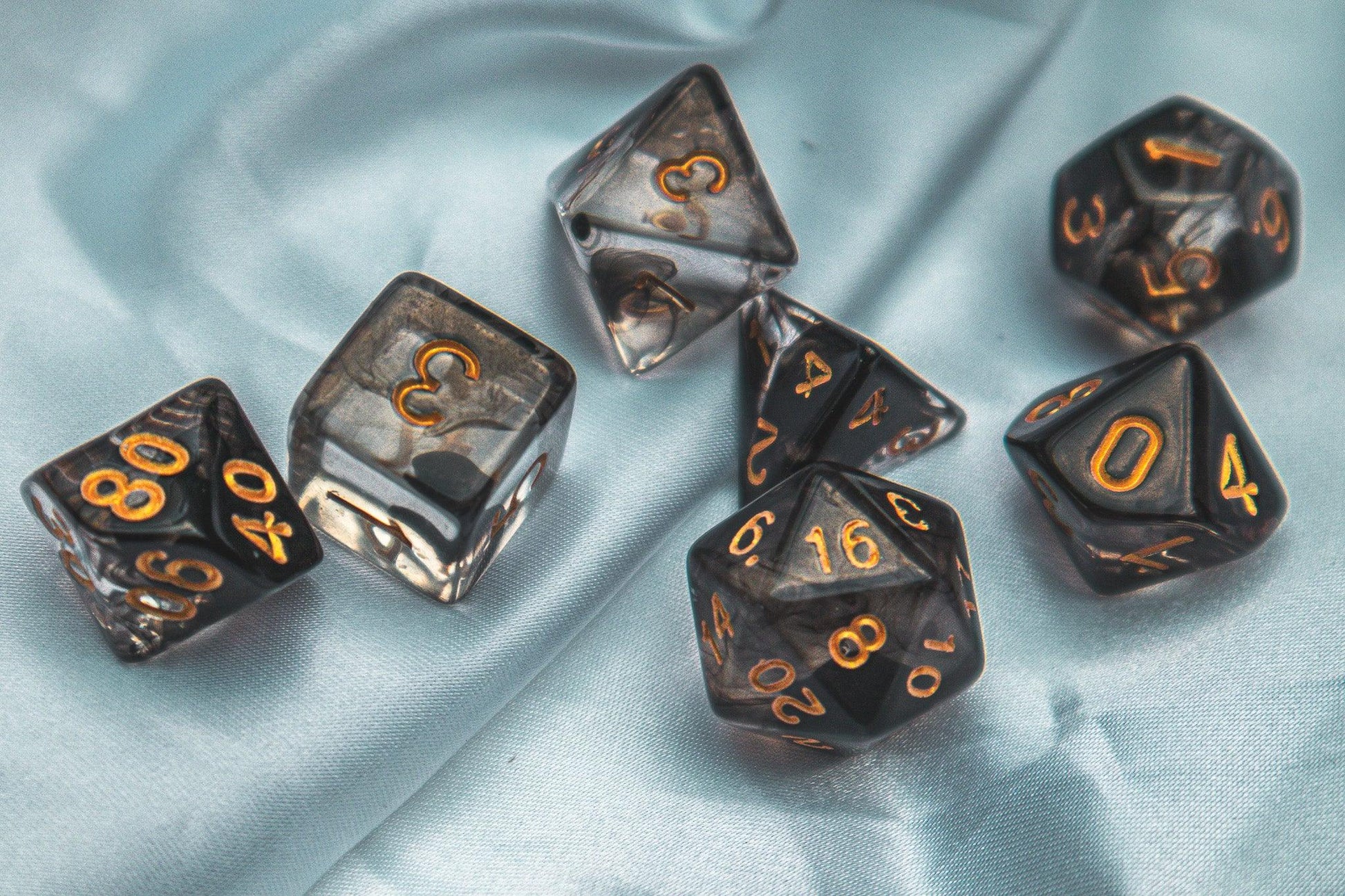 Cursed whispers dice set - The Flaming Feather & Flaming Filament
