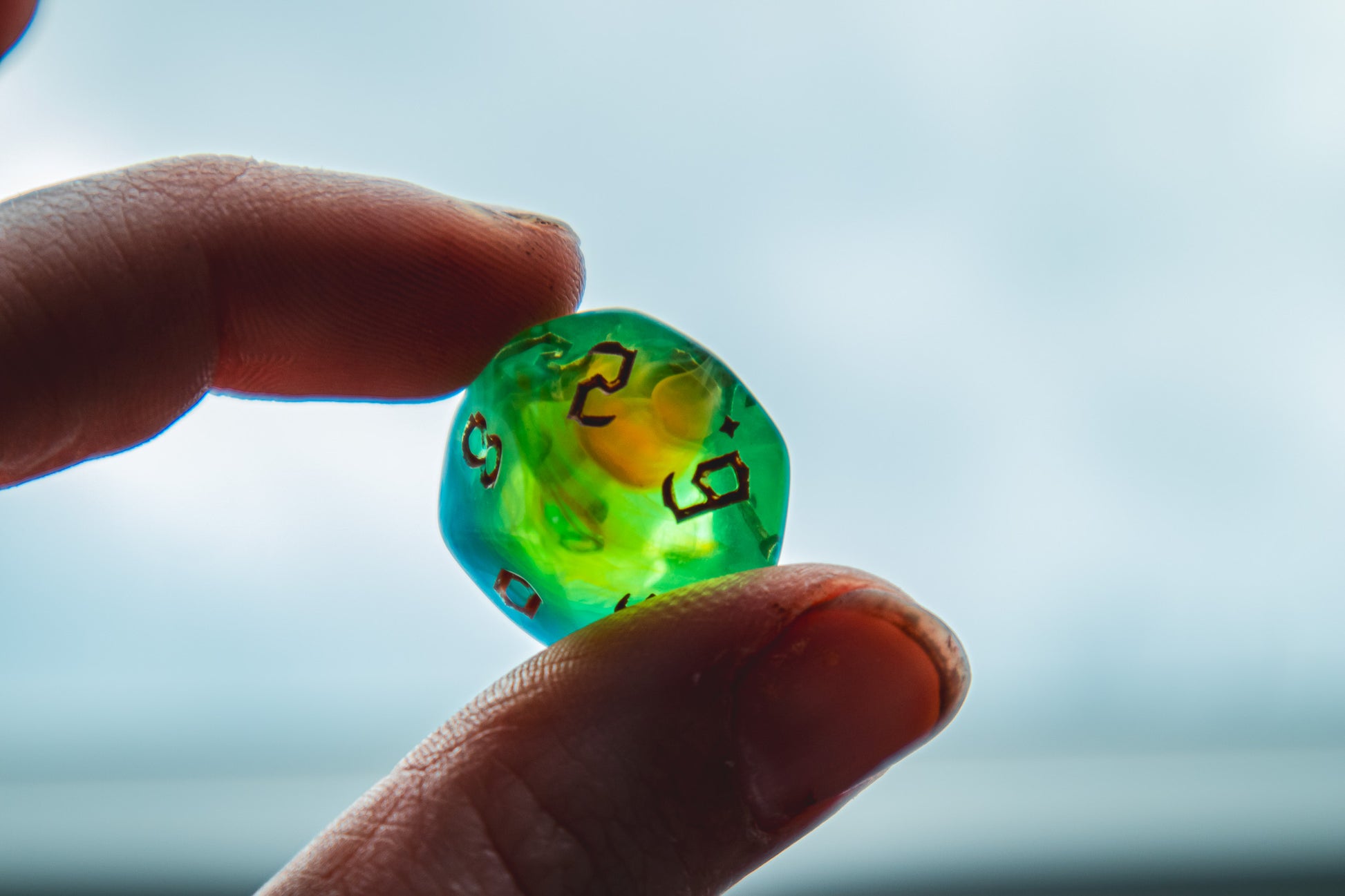 Northern Lights Polyhedral dice set - The Flaming Feather & Flaming Filament