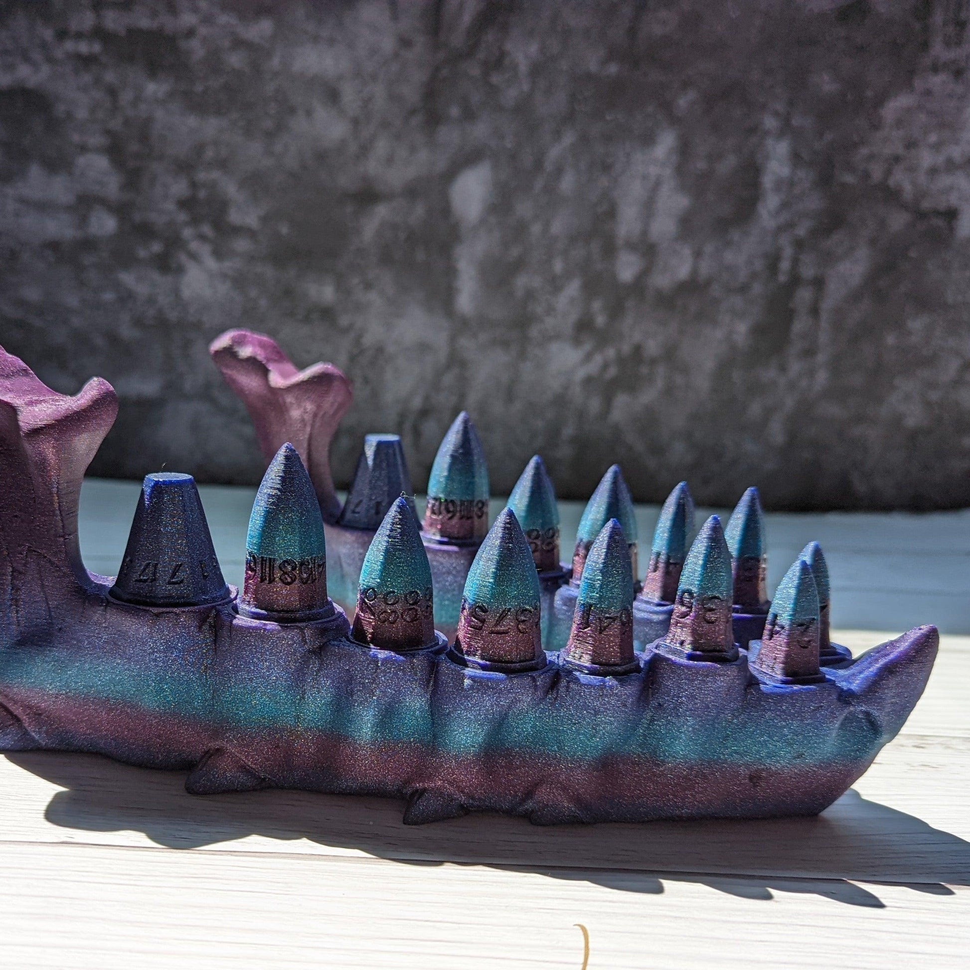 Dragon teeth dice set + holder - The Flaming Feather & Flaming Filament
