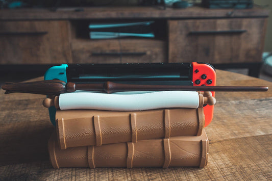 Magical Books Wandholder - Nintendo Switch Dock - The Flaming Feather & Flaming Filament
